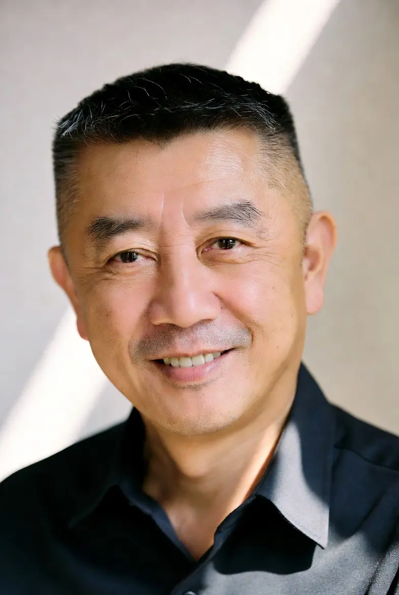 Profile photo of David K., an East Asian man in his early 50s